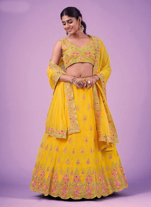 Yellow Haldi Wear Mirror Work Georgette Lehenga Choli