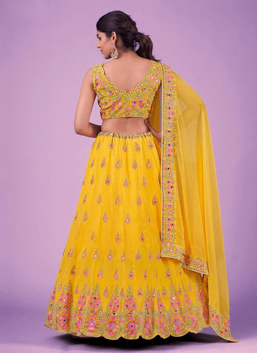Yellow Haldi Wear Mirror Work Georgette Lehenga Choli